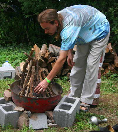 Kevin builds a fire in our makeshift fire pit.